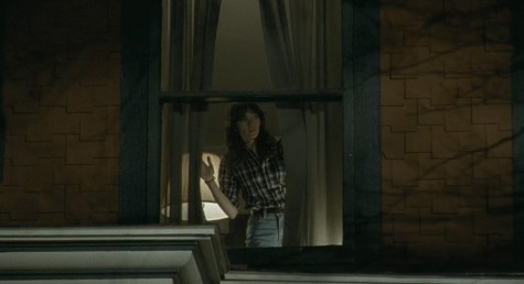 Samantha (Jocelin Donahue) inside the creepy house she's watching over in "The House of the Devil."