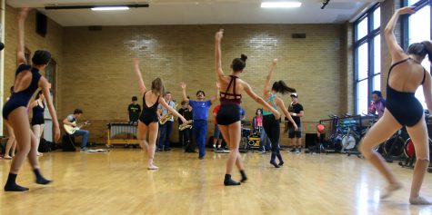 Community High's Dance Body and Jazz Band taking a class from Domingo Estrada, a dancer in Mark Morris Dance Group