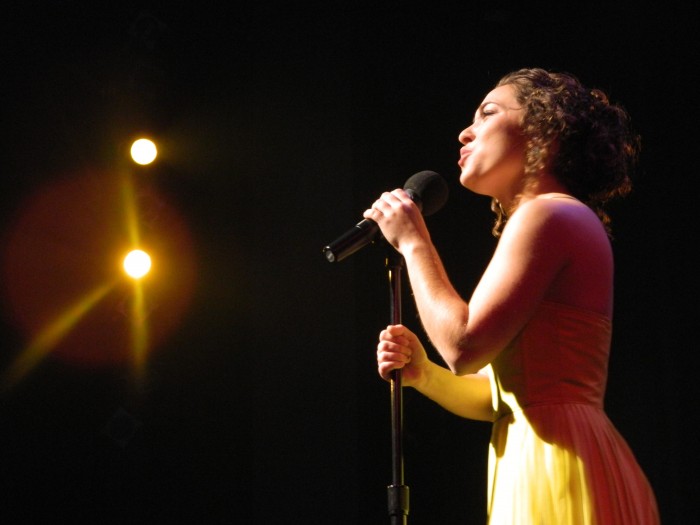 Eliza Stein singing her winning song "Cry Me Out" onstage at the FutureStars Finals.