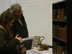 Audience members examine Wooten's collection following Wednesday's lecture.