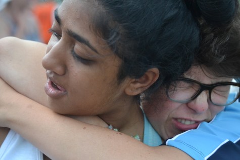 Kea von Emden and Tejal Patel hug after von Emden's third place finish in the Women's Varsity Quad.