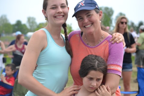 Emily Hatch and her mother Sue Hatch pose as her sister Mary-Margaret waits for the regatta to end.
