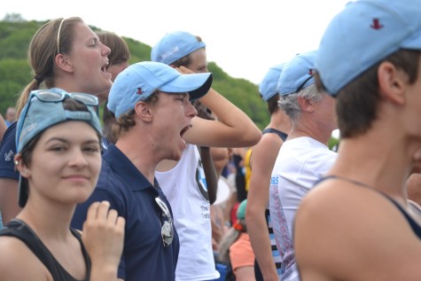 Coach Ben Frey yells passionately as Skyline finishes a close race.