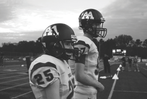 Rachel Hunsberger, place kicker onthe Varsity football team, watches on the sidelines. 